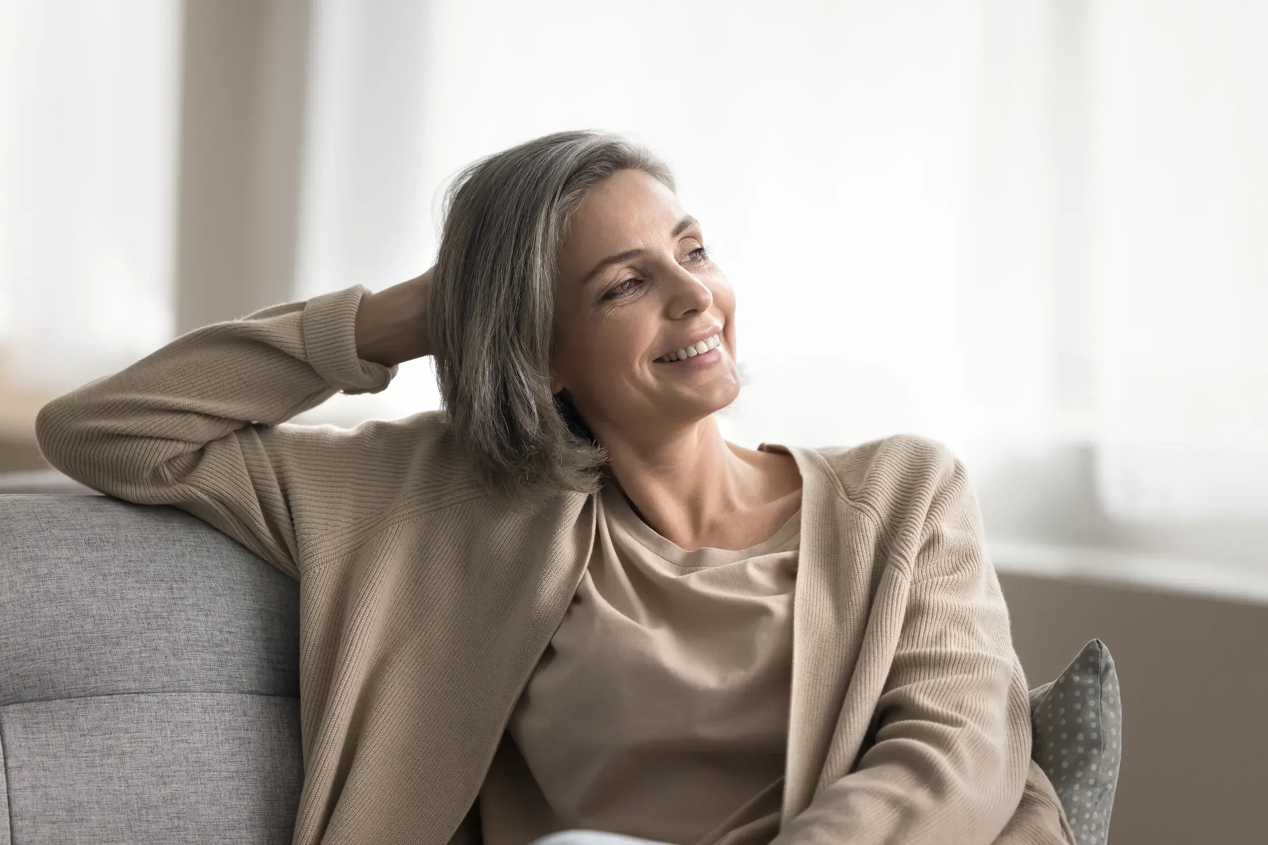 Woman addressing skin laxity concerns at Mint Aesthetics & Skin Indianapolis