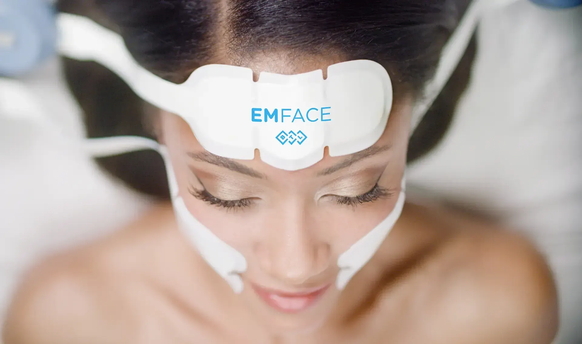 Abstract background representing Emface facial treatment areas at Mint Aesthetics & Skin